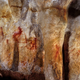 La Pasiega, section C, cave wall with paintings. The red vertical and horizontal lines date back 64,000 years, and were almost certainly painted by Neanderthals. (Image: P. Saura)